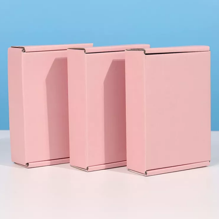 Scatola di imballaggio per abbigliamento in scatola di carta postale rosa per spedizione cosmetica ondulata con logo a colori stampato personalizzato