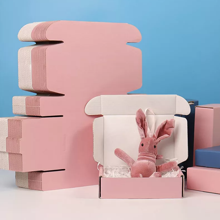 Scatola di imballaggio per abbigliamento in scatola di carta postale rosa per spedizione cosmetica ondulata con logo a colori stampato personalizzato