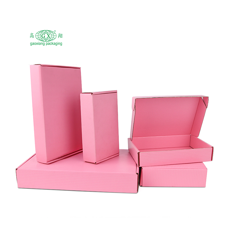Imballaggio di scatole di spedizione per spedizioni postali ondulate in cartone di carta rosa multiuso con logo personalizzato