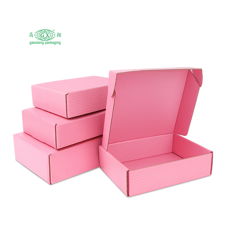 Imballaggio di scatole di spedizione per spedizioni postali ondulate in cartone di carta rosa multiuso con logo personalizzato