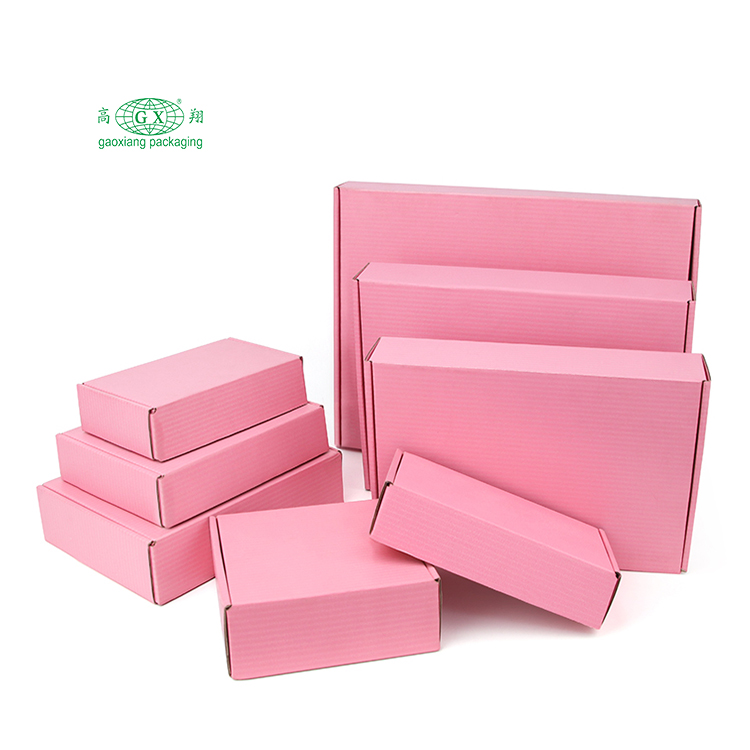 Imballaggio di scatole di spedizione per spedizioni postali ondulate in cartone di carta rosa multiuso con logo personalizzato