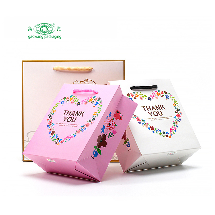 Sacchetti regalo in carta con logo di design di lusso stampati personalizzati con manici
