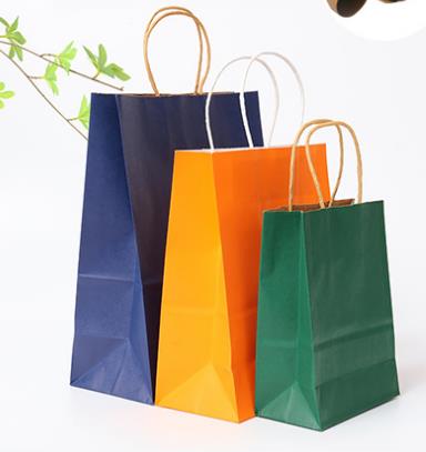 Borsa in carta kraft marrone riciclabile con logo personalizzato all'ingrosso con manico piatto attorcigliato