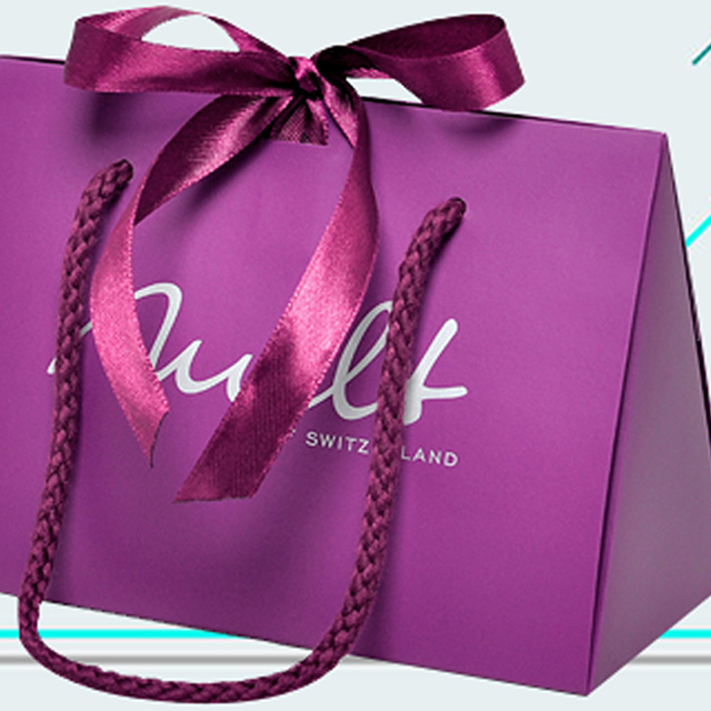 Sacchetto di carta in cartone stampato con logo completo viola stampato di lusso personalizzato con manico a fiocco in nastro per scatole della spesa per regali